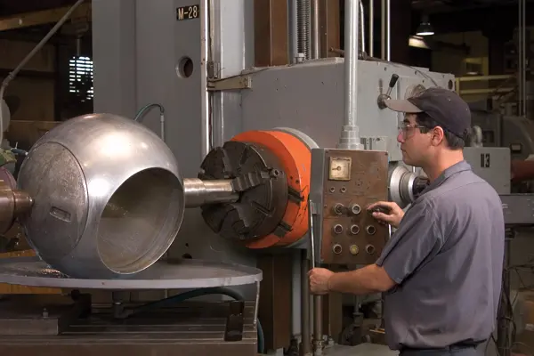 Man performing industrial valve repair