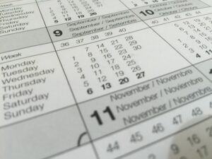 Close up of a calendar page being used to plan industrial valve repair service 