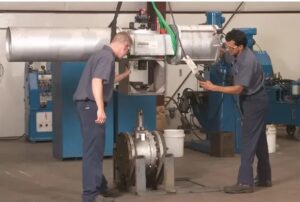 in-house employees performing valve actuator repair